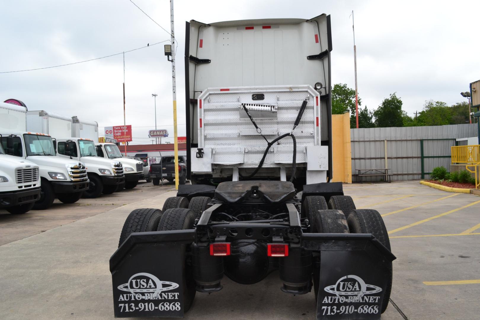 2016 WHITE /BLACK INTERNATIONAL PROSTAR+ with an CUMMINS ISX 15L 450HP engine, EATON FULLER 10SPD MANUAL transmission, located at 9172 North Fwy, Houston, TX, 77037, (713) 910-6868, 29.887470, -95.411903 - 76" RASIED ROOF SLEEPER, ELECTRIC APU, WB: 226", DOUBLE BUNK, 5TH WHEEL SLIDE, AIR RIDE, DUAL 95 GALLON FUEL TANKS, ENGINE BRAKE, MINI FRIDGE - Photo#5